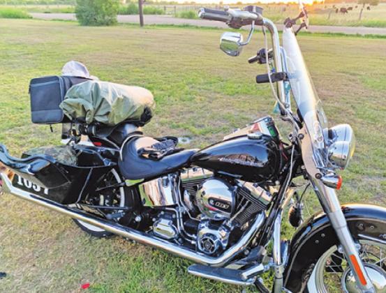 PICTURED IS TIM OWENS’ motorcycle -- packed and ready to head out on the Hoka Hey Motorcycle Challenge. Owens recently completed the 10,000-mile challenge to raise money for local charities.