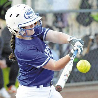 KAYLN COOPER hits the ball for a sacrifice fly during the Snook-Somerville game last Tuesday. -- Tribune photo by Denise Squier