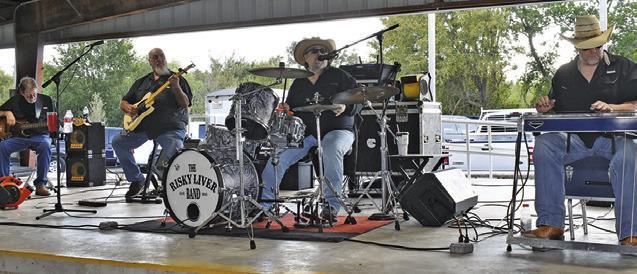 THE RISKY LIVER BAND performs on Saturday at Snook Fest at Snook City Park. Tribune photo by Roy Sanders