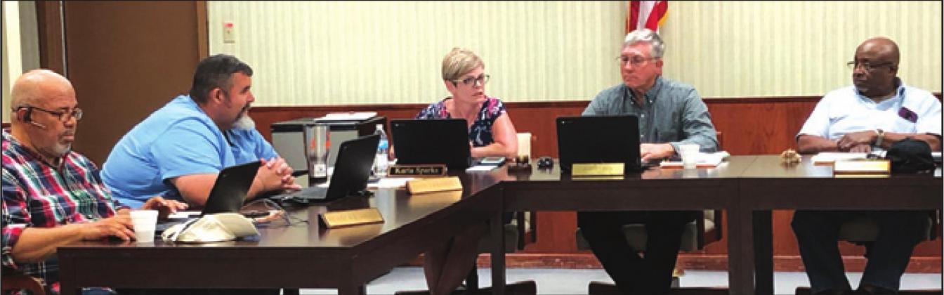 THE SOMERVILLE ISD SCHOOL BOARD met on Wednesday, March 18, to extend Superintendent Karla Sparks’ contract and to approve contracts on needed repairs to the Yegua Center, The Rock and the running track. -- Tribune photo by Denise Hornaday
