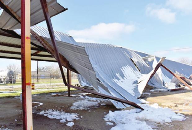 THIS ROOF DAMAGE at the Caldwell Bus Barn is pictured after last week’s winter storm. -- Tribune photo by Roy Sanders