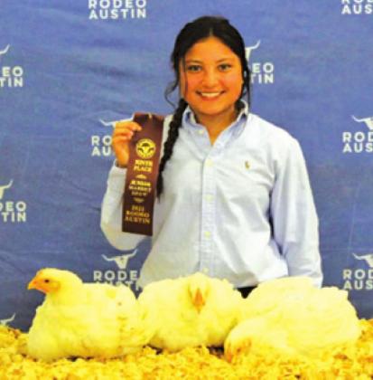 CALDWELL FFA member Macy Narro placed ninth with her pullet pen of market broilers.