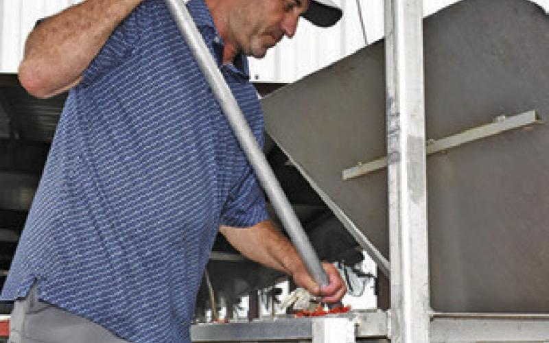 KEVIN FRITSCHE cooks on Friday at the Caldwell Education and Leadership Foundation (CELF) shrimp and crawfish dinner fundraiser at the Burleson County Expo Center. Tribune photo by Roy Sanders