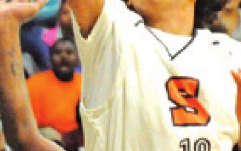 GARDNER SHIVERS ATTEMPTS to make a basket during the Yeguas’ area round loss to Hearne. -- Tribune photo by Denise Squier