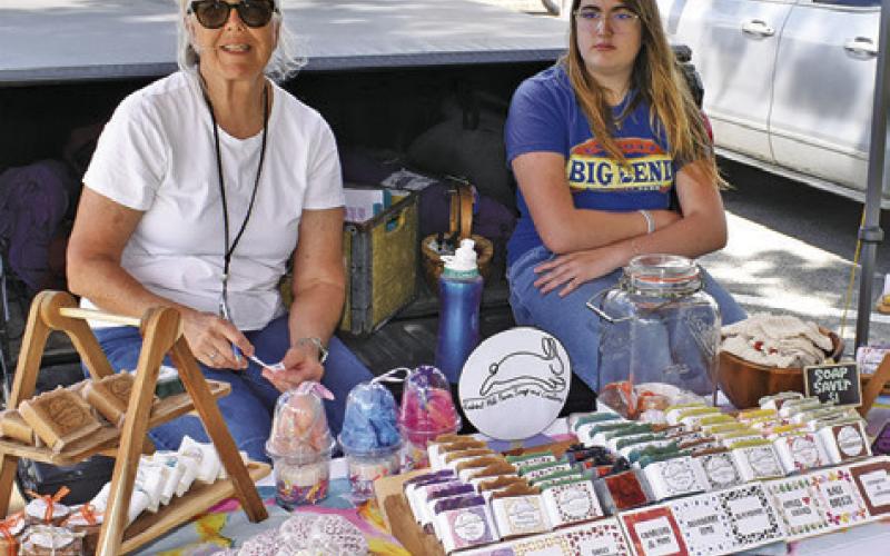 EDNA AND HOPE Schulz of Rabbit Hill Farm Soap and Creations displays their products on Saturday at the Farmers Market in Caldwell.