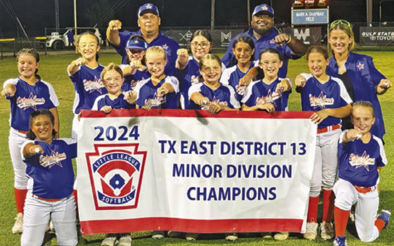 THE BURLESON COUNTY LITTLE LEAGUE Minor All-Star Softball Team is pictured with its district and sectional championship banners.