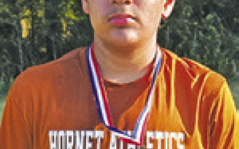 AXAVIAR AGUILAR placed eighth in the boys race at the district junior high cross country meet.