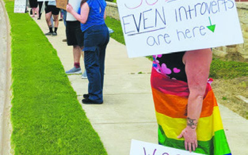 PROTESTERS WITH Burleson County Democrats, Libertarians and Independents for Action (BCDLIA) demonstrated in front of the Caldwell Civic Center on Saturday.