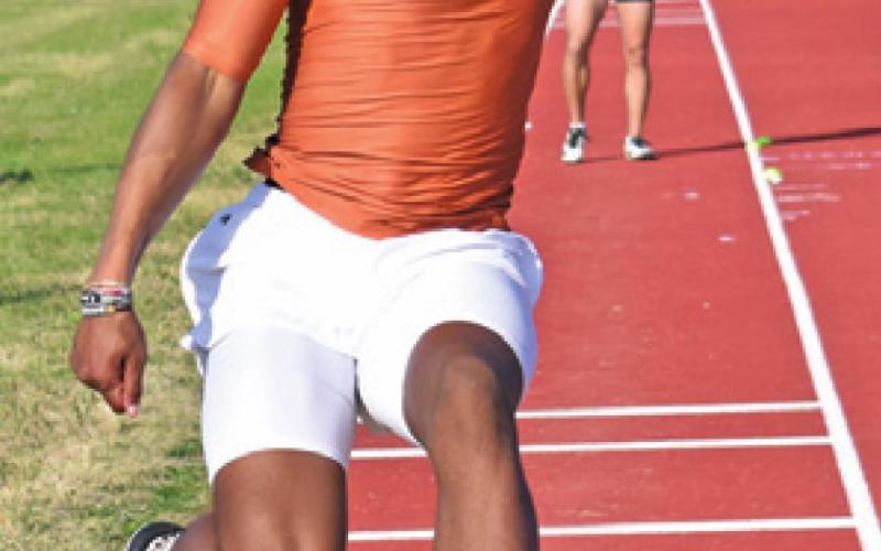 TREY BURNS LEAPS during his flight of the triple jump at last week’s Koppers Relays.