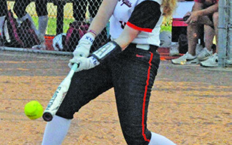 KYLIE NEUENDORFF makes contact with the ball during Somerville’s home game against Burton on Friday. Tribune photo by Denise Squier