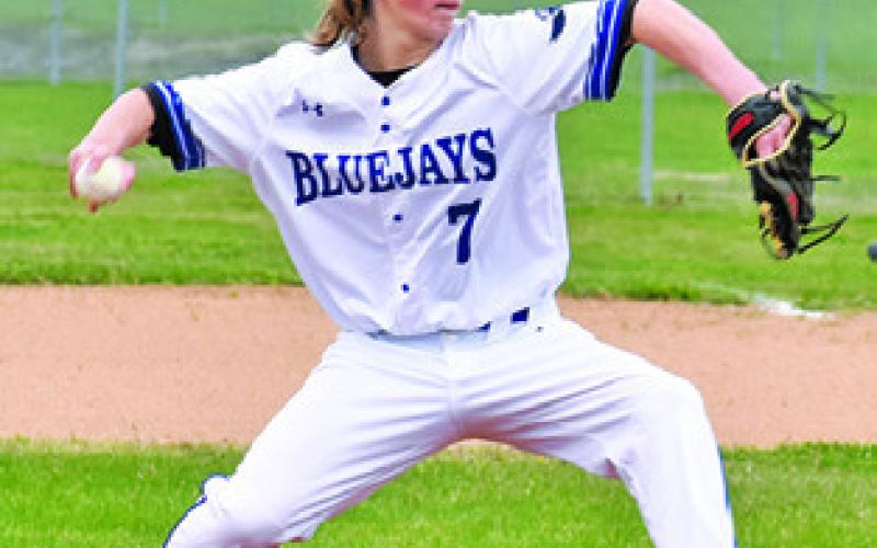 BONHAM BOSLEY of Snook hurls this pitch against St. Joseph last Friday in Snook. Tribune photo by Roy Sanders