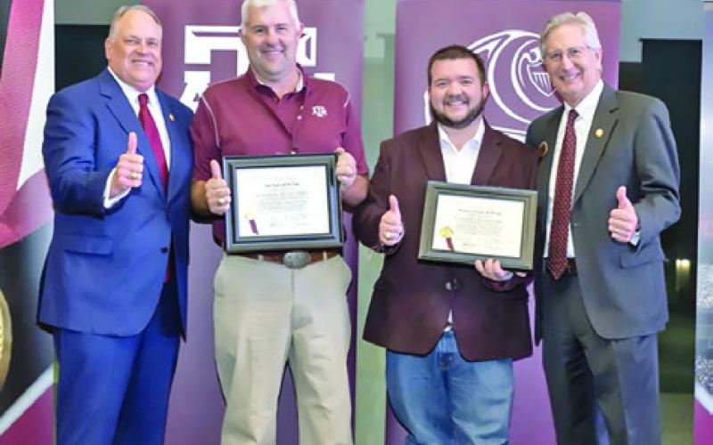 Pictured from Left to Right are Porter S. Garner, Association of Former Students President, the newly elected President of the San Saba A&amp;amp;M Club (name unknown), Trey Groce, President of the Burleson County A&amp;amp;M Club, and Mr. Bobby Jenkins, President of the Board of Directors for the Association of Former Students. Photo courtesy of The Association of Former Students