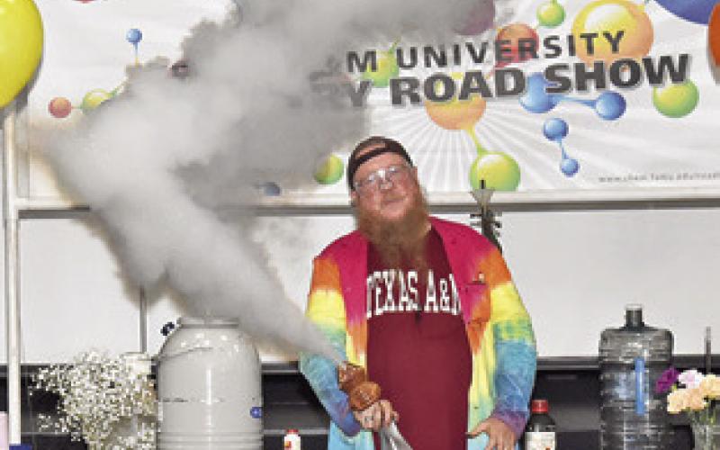 DR. JIM PENNINGTON of Texas A&amp;amp;M University shares these demonstrations at the Texas A&amp;amp;M University Chemistry Road Show on Thursday, July 24, at the Caldwell Civic Center. Many local youths attended. Tribune photo by Roy Sanders
