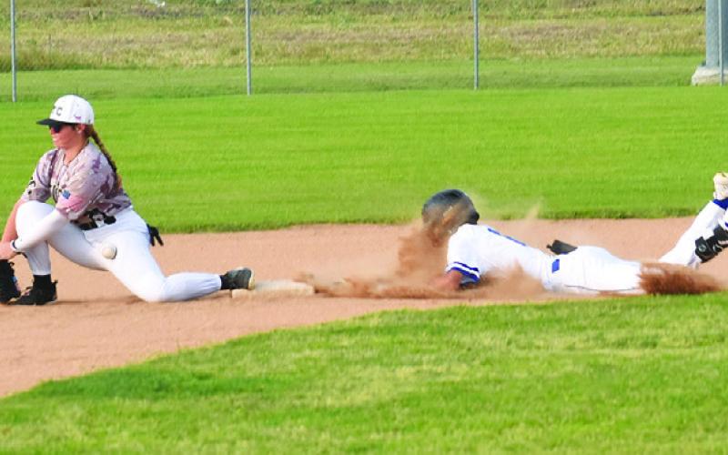 BRETT WITHEM SLIDES into second base against Round Top-Carmine. The Bluejays won 11-1 in their season finale. -- Tribune photo by Roy Sanders