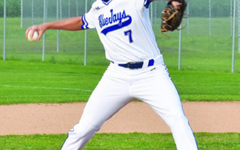 J. BEAUX HRUSKA pitches for Snook in his last game. -- Tribune photo by Roy Sanders