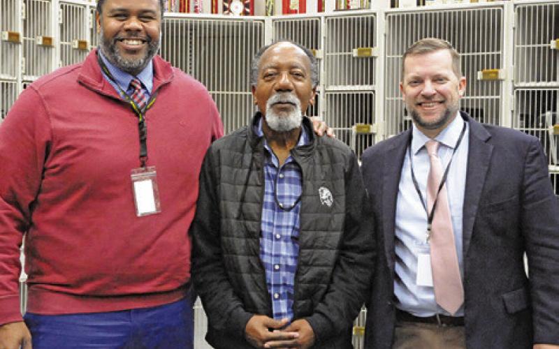 SOMERVILLE BAND DIRECTOR Carl Idlebird, center, is being inducted into the ATSSB (Association of Texas Small School Bands) Hall of Fame on Feb. 14. He is pictured with Somerville High School Principal Steven Toliver and Somerville ISD Superintendent Eric Holton. Tribune photo by Denise Squier