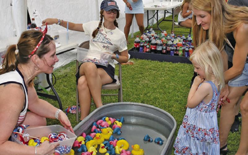 DUCKS IN THE tub is a children’s favorite every year at the July 3 celebration at Elizabeth Lutheran Church in Caldwell.