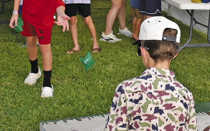 CHILDREN ENJOY games on Friday, July 3, at the Elizabeth Lutheran Church celebration.