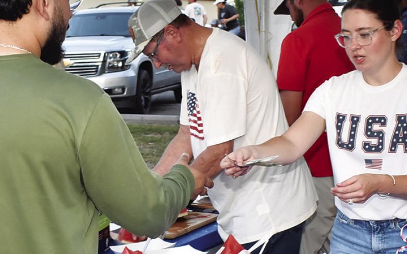 WATERMELON IS ALWAYS a favorite at the July 3 celebration at Elizabeth Lutheran Church in Caldwell.