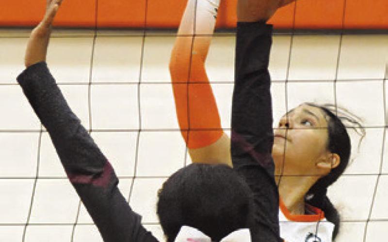 ANETTE REYNA gets a kill during Friday’s Somerville-Hearne match. Tribune photo by Denise Squier