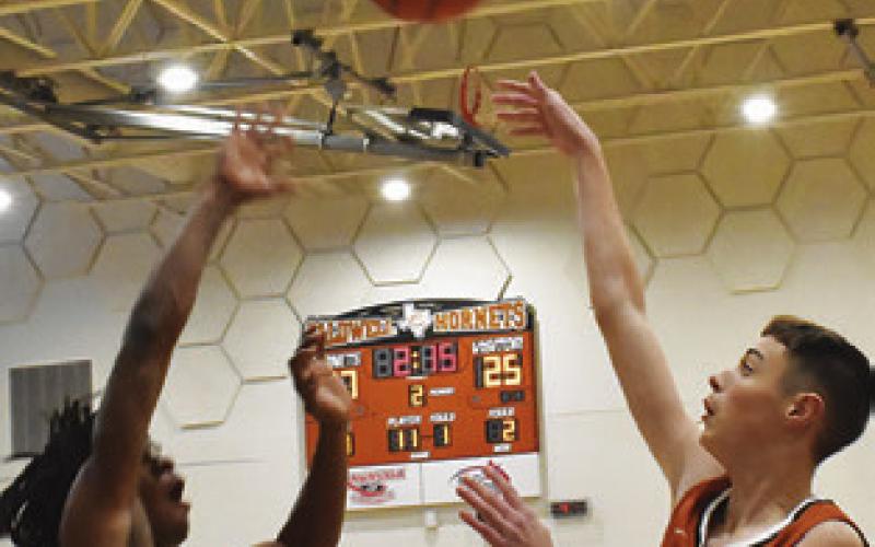 LOGAN COLBERT of Caldwell takes a shot against Hempstead at the tournament. Tribune photo by Roy Sanders