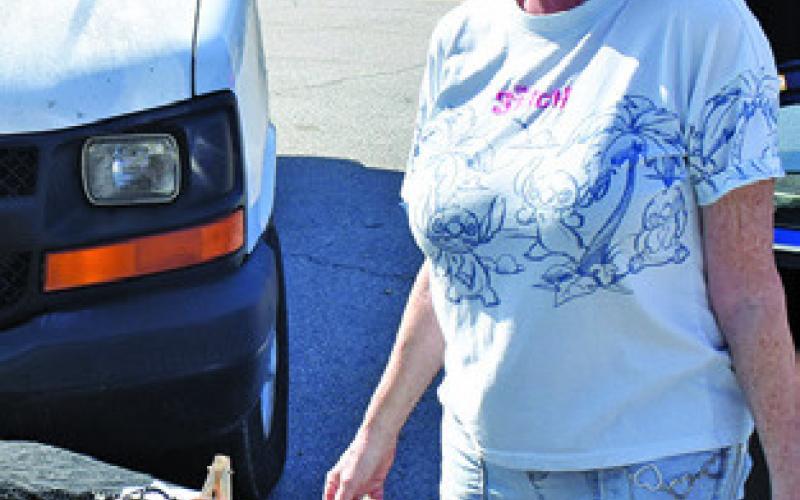 ROXANNE WALDEN of Roxy’s Rocks of Beaver Creek greets visitors on Saturday, Feb. 28, at the Farmers Market in Caldwell.