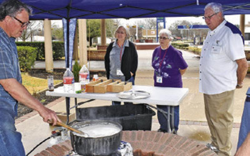 BRUNO SHIMEK DEMONSTRATES how to make lye soap on Saturday at the Caldwell Civic Center. The Texas Czech Genealogical Society hosted their Roots, Routes and Recipes event there. Tribune photo by Roy Sanders