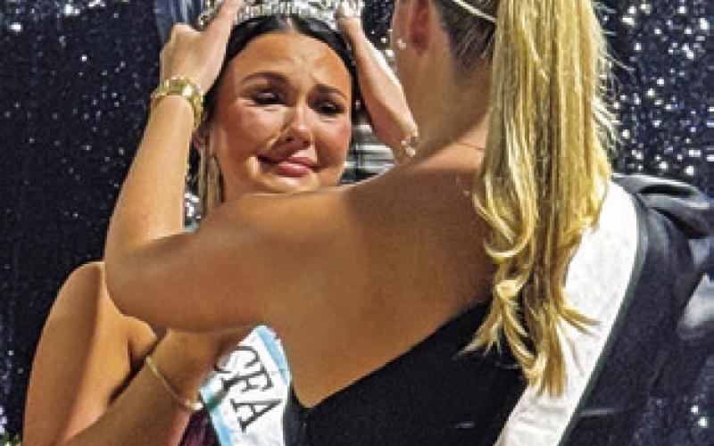 KODI HITCHCOCK was crowned the 2025 Burleson County Fair Queen on Sunday by last year’s Fair Queen Hadleigh Novosad. Tribune photo by Denise Squier