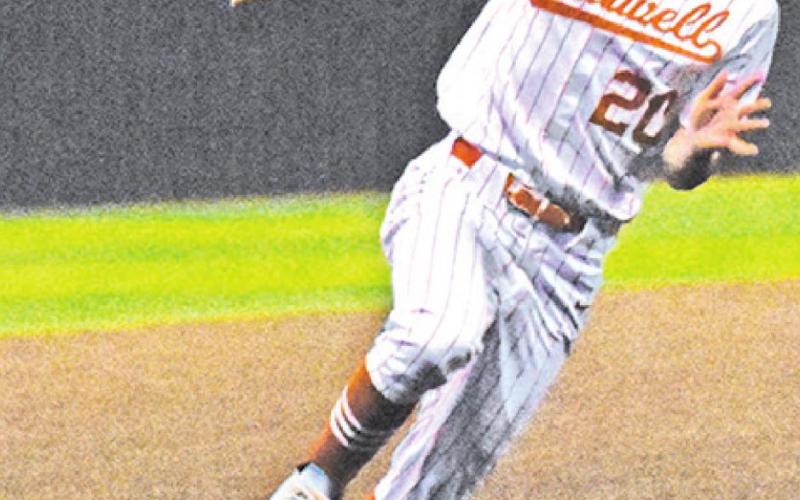 CONOR LEE of Caldwell runs for third base against Rockdale. The Hornets won 8-5.