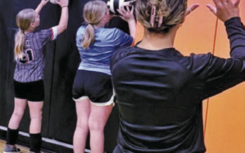 PARTICIPANTS AT last week’s Lady Yegua Volleyball Camp work on setting.