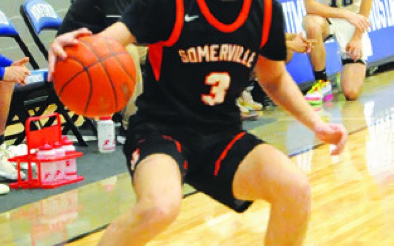 STEVAN MARTINEZ dribbles the ball against Mumford last Friday in Mumford. Tribune photo by Denise Squier