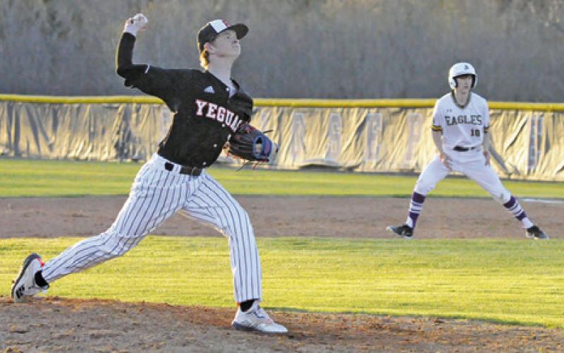 BARRETT HOWE OF Somerville hurls this pitch against St. Joseph.