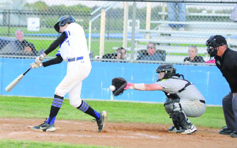 SNOOK’S J. BEAUX Hruska takes a swing as Somerville catcher Chance Esparza makes the catch in game two of their double header. -- Tribune photo by Denise Squier
