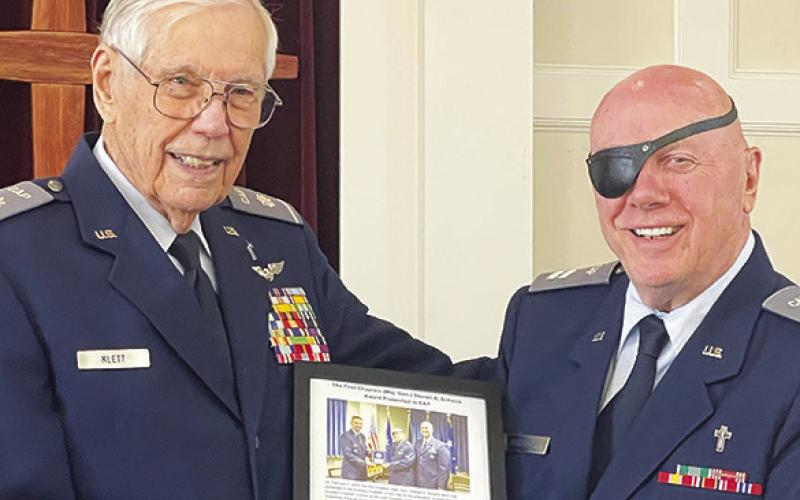 REV. PHINEAS JACOBUS (right), pastor of the First Presbyterian Church of Caldwell, was recently honored as the Auxiliary Chaplain of the Year at the graduation of class 25A of the Auxiliary Chaplain Course at the CAP Chaplain Corps College. Rev. George Klett (left) is also pictured.