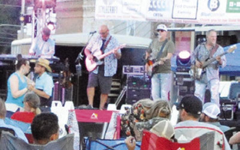 CALDWELL welcomed Texas Unlimited Band for the first installment of Main Street’s Summer Concert Series. The next concert will be on Saturday, July 13, featuring People’s Choice. -- Tribune photo by Denise Squier