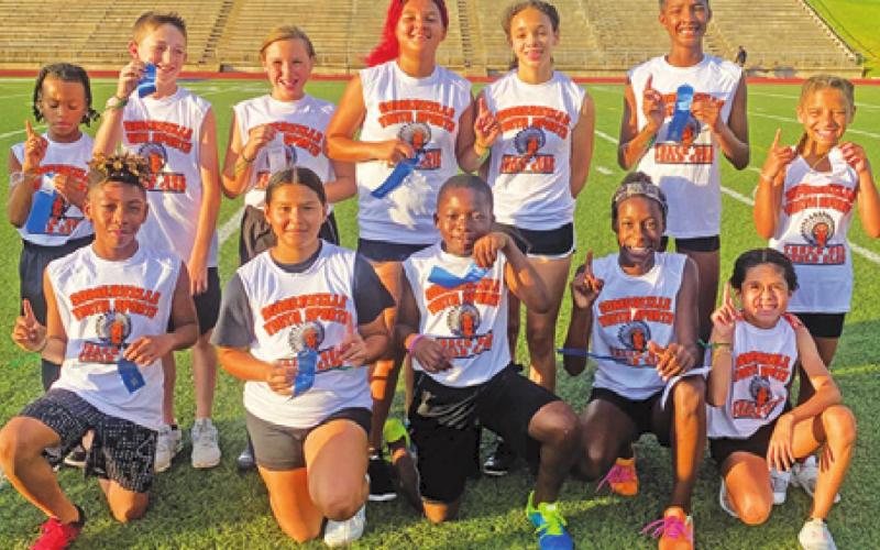 SOME SOMERVILLE Youth Sports athletes who ran in Bryan are, from left, back, Landon Vela, Kade Groce, Abigail Richardson, Serenity Leverette, Jade Lauderdale, Karys Ellis and Ajiriana Sims, front, Isiah Cloud, Emily Garza, John Isom Jr., Janaya Isom and Alexia Lucio.