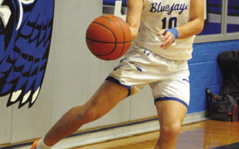 BRAEDYN FANNIN of Snook prepares to pass against Bremond last Friday. Tribune photo by Denise Squier