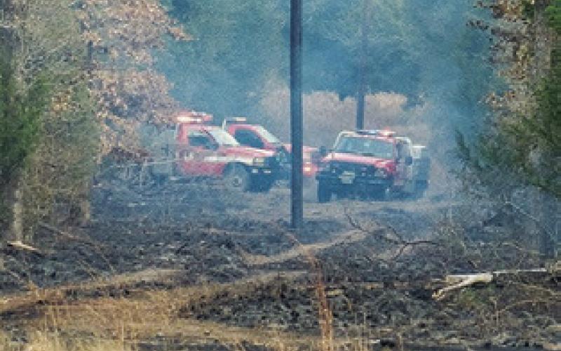 AREA FIREFIGHTERS respond to this fire near Yegua Creek Park in Washington County. Photo courtesy of Snook VFD