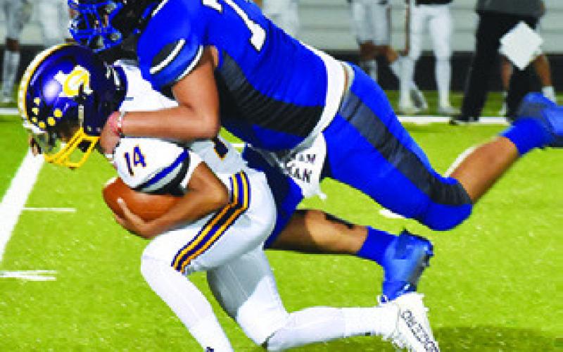 RAMIRO MARTINEZ of Snook makes a tackle against Granger last Friday in Snook. Tribune photo by Roy Sanders