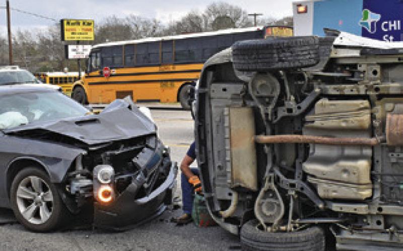 THIS ACCIDENT OCCURRED on Monday afternoon on State Highway 21 West near the Dollar Tree store in Caldwell. Tribune photo by Roy Sanders