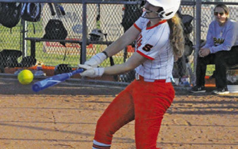 SOMERVILLE’S KYLIE Jo Neuendorff hits an in-the-park home run during the Lady Yeguas blowout win over North Zulch Friday. Tribune photo by Denise Squier