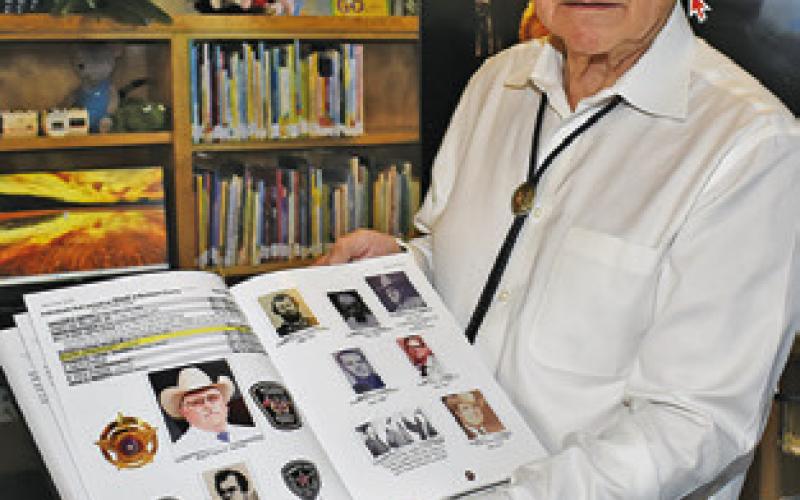 RONNIE ERWIN displays the book with this chapter focusing on Burleson County’s sheriffs.