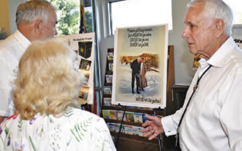 RONNIE ERWIN TALKS to audience members at his July 15 presentation at the library.