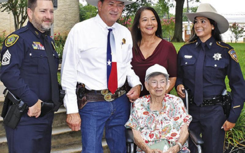 NEW BURLESON COUNTY Sheriff Bill Rios is joined by family members on Tuesday, June 10, for his swearing in ceremony. Pictured from left are his son Willie Rios, a Houston Police Department sergeant, his wife Irma Rios, his mother Mary Rios and his daughter Stephanie Goodrich, a Harris County sheriff’s deputy.