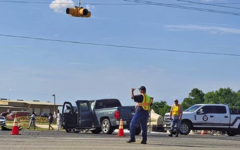 SNOOK VOLUNTEER FIREFIGHTERS and other emergency responders work the scene of this accident on Sunday afternoon off F.M. 60 and F.M. 50. Photo courtesy of Snook Volunteer Fire Dept.