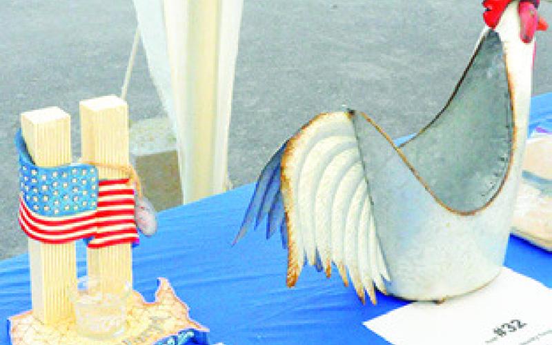 PATRIOTIC AND country-themed items were in the silent auction at the Elizabeth Lutheran Church’s July 3rd Celebration. Tribune photo courtesy of Denise Squier