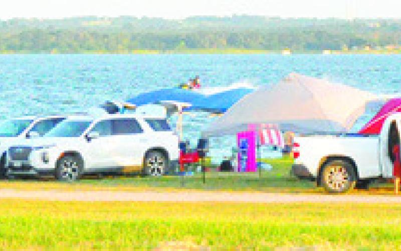 SEVERAL HUNDREDS OF people were enjoying the great weather at Welch Park on Lake Somerville on July 4. Tribune photo courtesy of Denise Squier