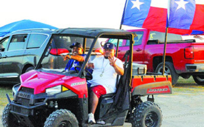 THESE TWO MEN were celebrating July 4 at Welch Park at Lake Somerville. Tribune photo courtesy of Denise Squier