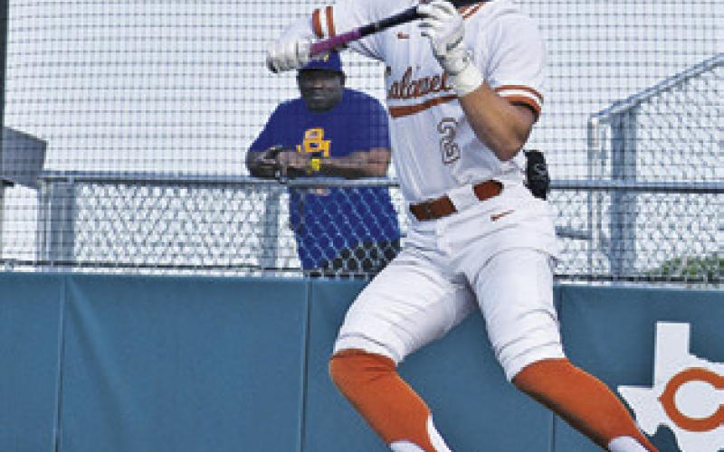 CALDWELL’S BLANE Garza bunts against Booker T. Washington in the bi-district game.