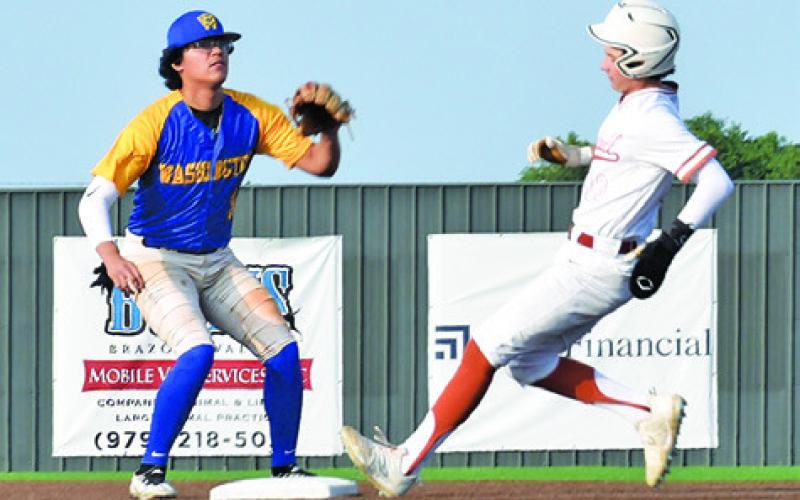 CADEN SCHLUENS RUNS for second base in the bi-district game against Booker T. Washington. -- Tribune photo by Roy Sanders